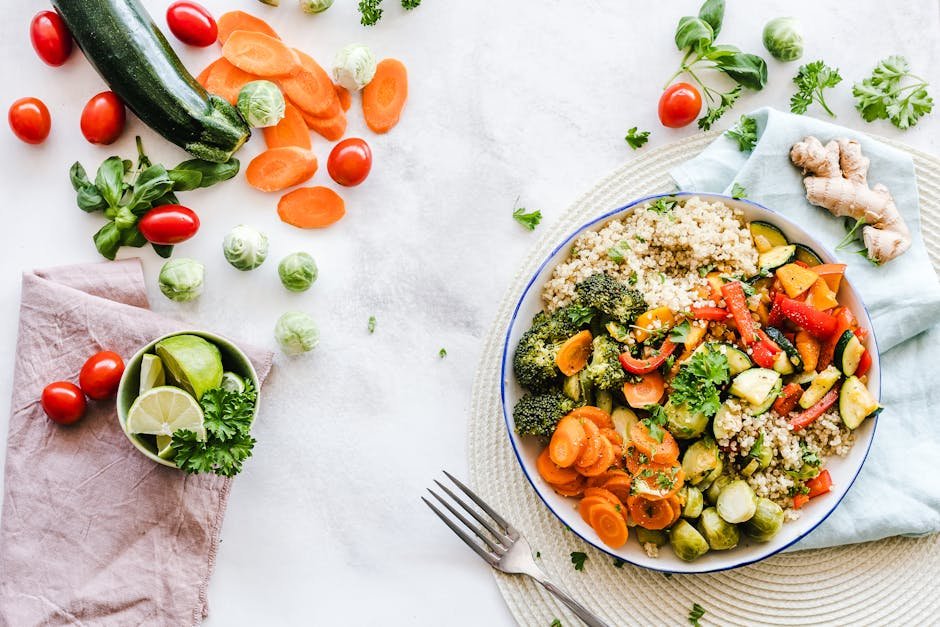 Colorful quinoa salad with fresh vegetables creates a healthy, balanced meal. balanced diet
